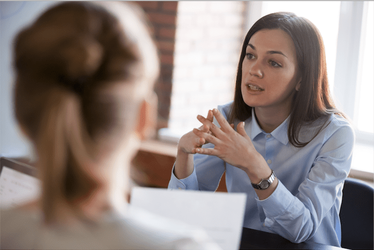 Serious Woman Talking With Someone