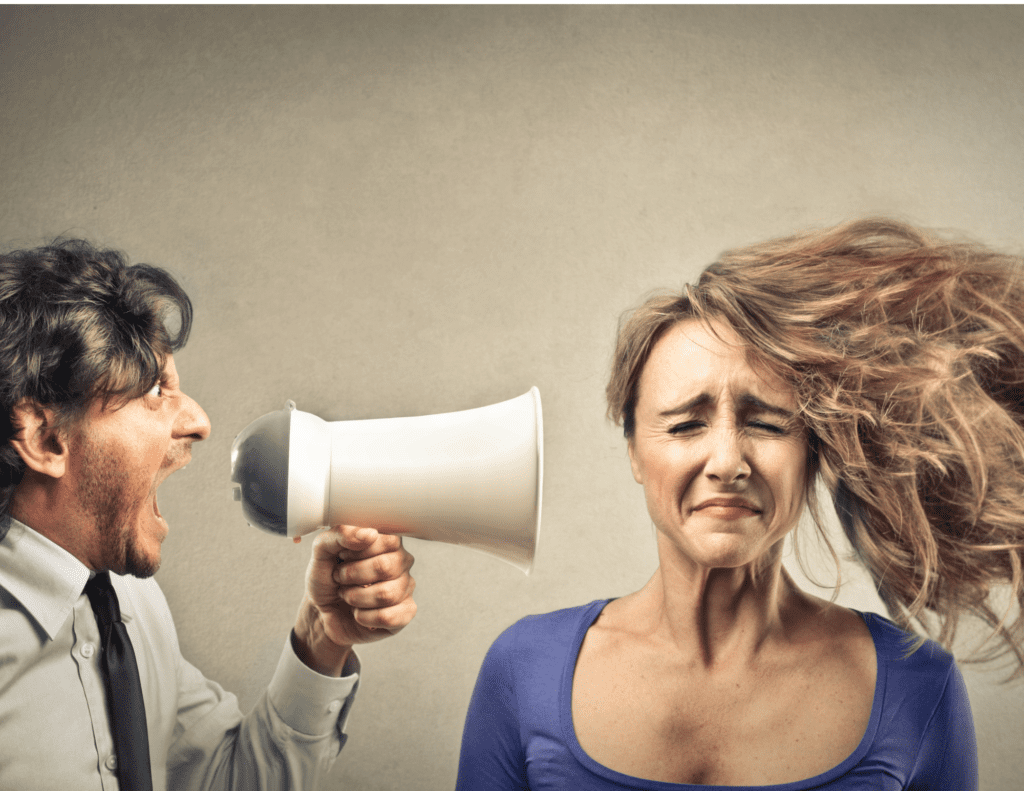 Man Screaming Into A Voice Amplifier Straight Into A Woman's Ear