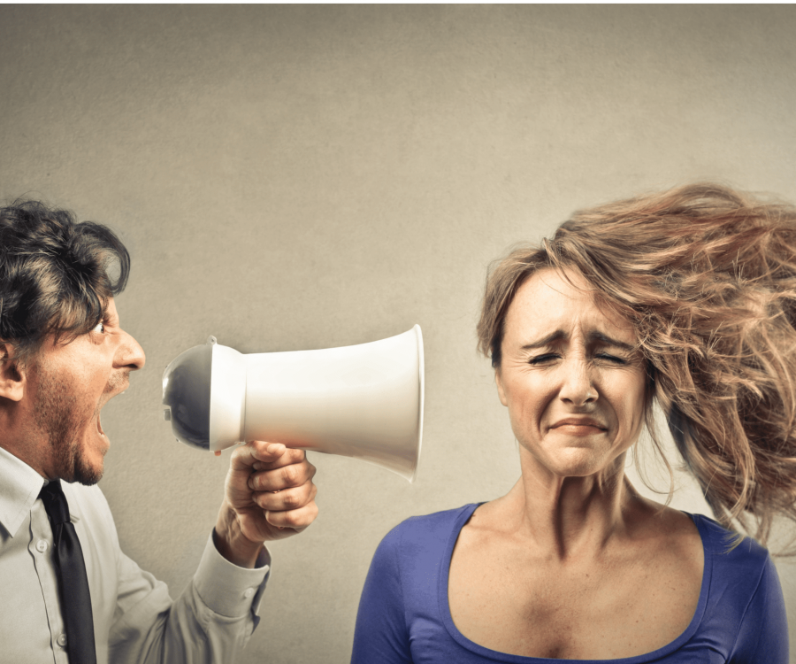 Man Screaming Into A Voice Amplifier Straight Into A Woman's Ear